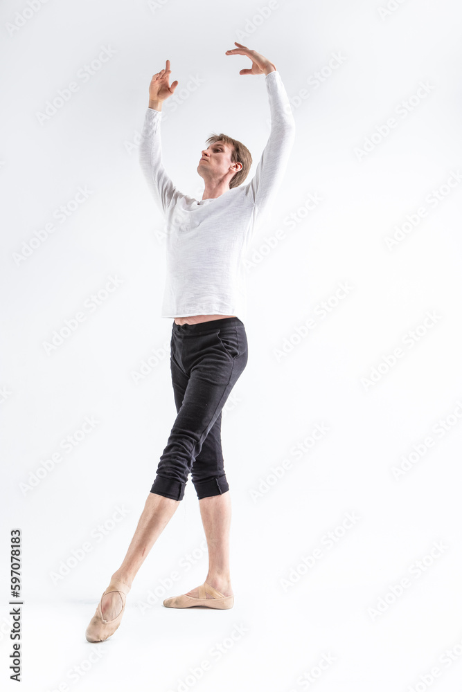 One Young, Handsome, Sporty Athletic Ballet Dancer with Lifted Hands on White. One Young, Handsome, Sporty Athletic Ballet Dancer with Lifted Hands on White.