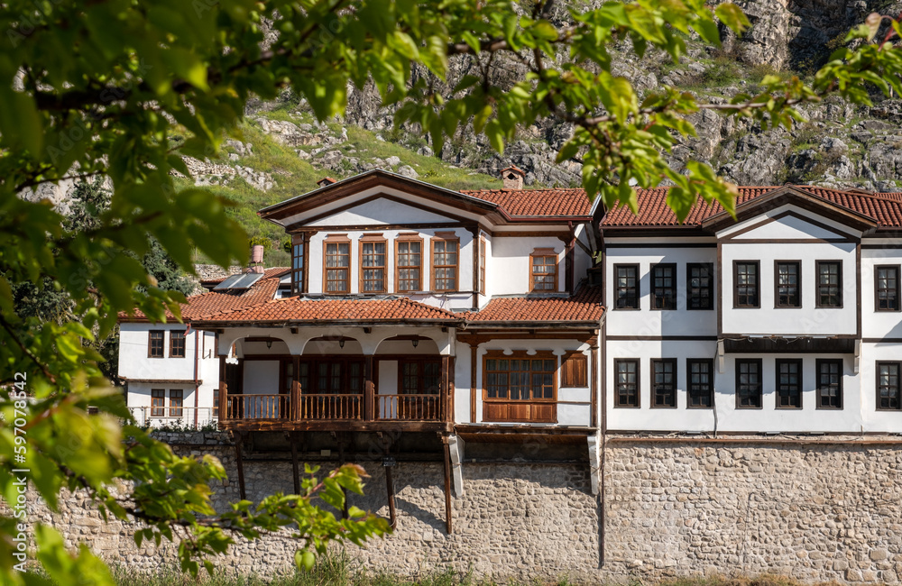 An ottoman house on a hill with a large roof and windows