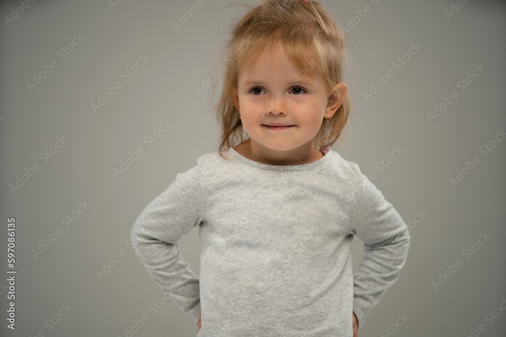 Portrait of a happy smiling child girl isolated over white background. Copy space for ad. Portrait of a happy smiling child girl isolated over white background. Copy space for ad.