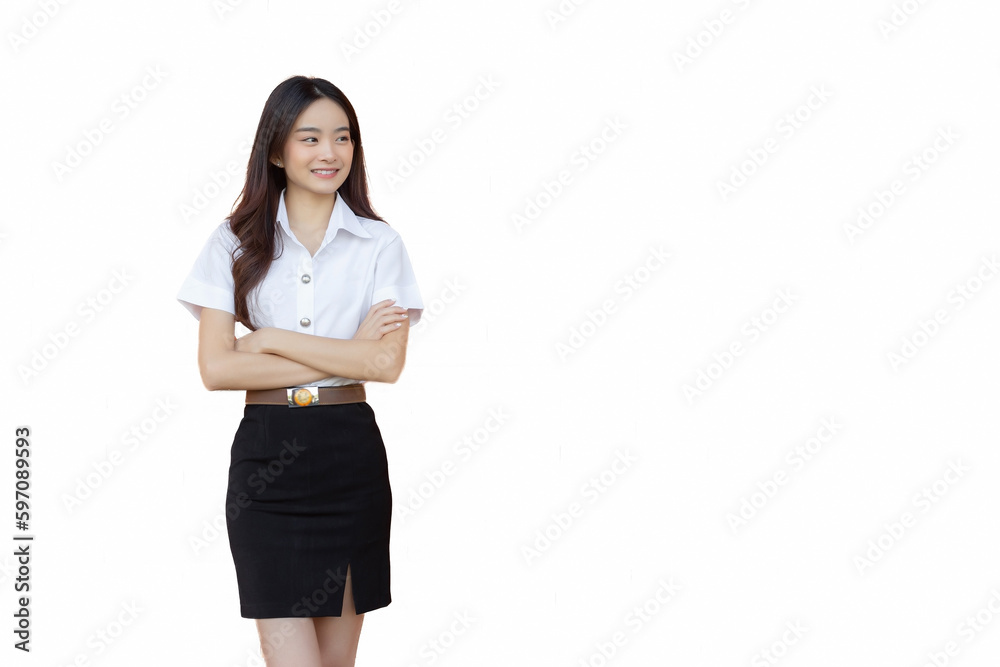 Portrait of an adult Thai student in university student uniform. Beautiful Asian girl standing smiling happily and confidently with her arms crossed isolated on white background. Portrait of an adult Thai student in university student uniform. Beautiful Asian girl standing smiling happily and confidently with her arms crossed isolated on white background.