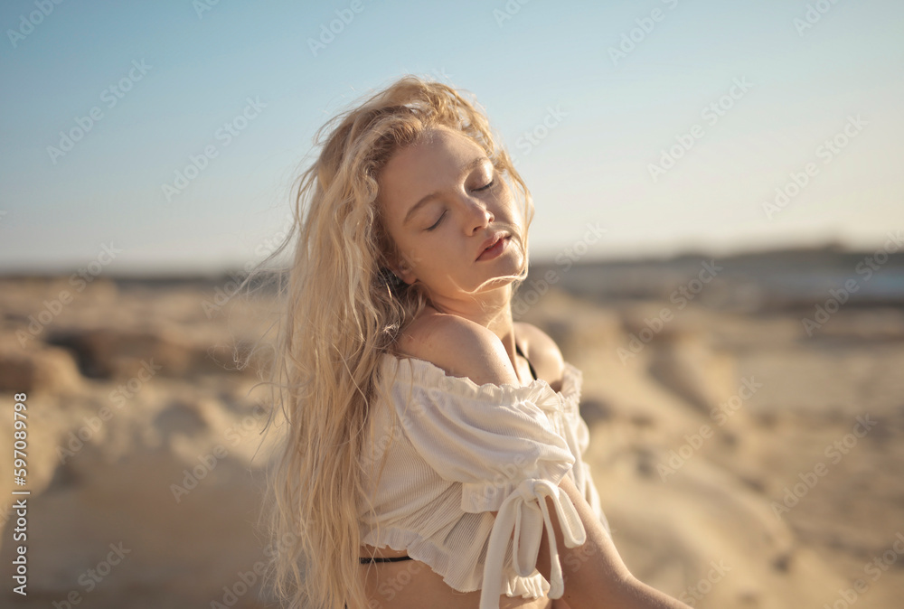 portrait of young blonde girl at the sea portrait of young blonde girl at the sea