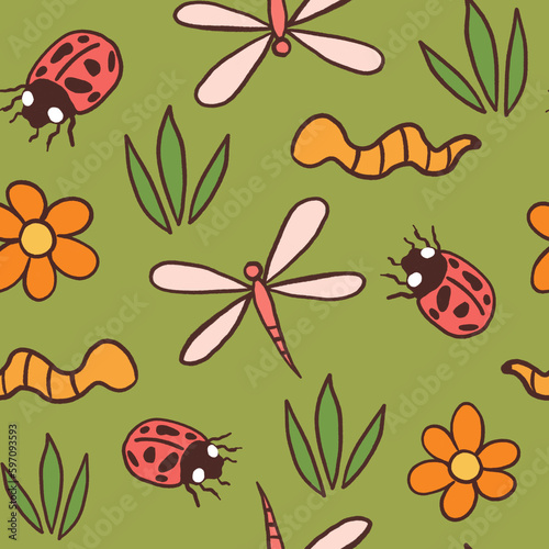 cute colorful hand drawn cartoon seamless pattern illustration with ladybugs, worms, daisy flowers and dragonflies on green background