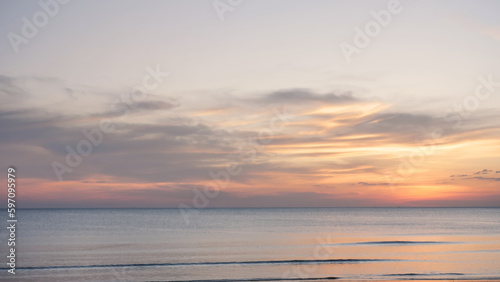 Beach and sky during sunset time