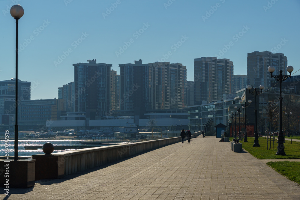 Fototapeta premium New comfortable embankment on Black Sea coast in Novorossiysk. Novorossiysk, Russia - December 20, 2022