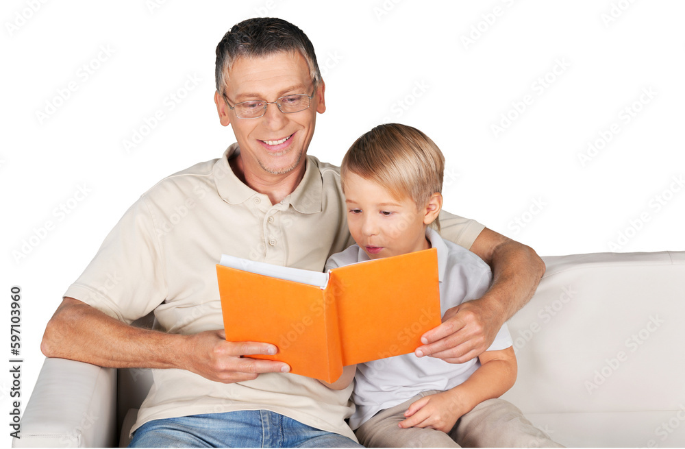 Grandfather and little child reading book happy together at home Grandfather and little child reading book happy together at home