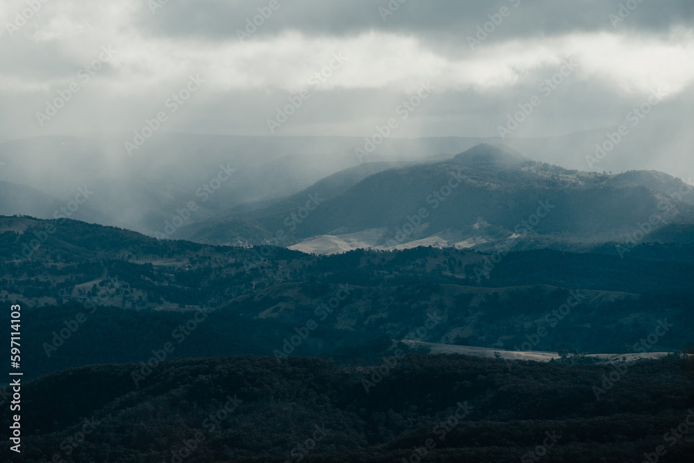 Rain clouds rolling into the Megalong Valley from Cahill's Lookout, Blue Mountains. Rain clouds rolling into the Megalong Valley from Cahill's Lookout, Blue Mountains.