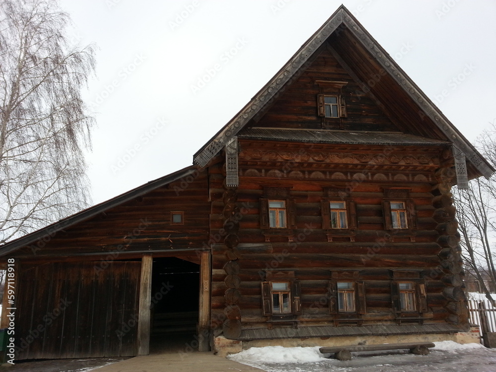 old wooden house in winter