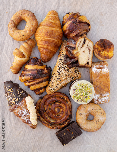 sweet pastry assortment top view.french pastries.Many mixed breads.Delicious looking french croisant, top view
