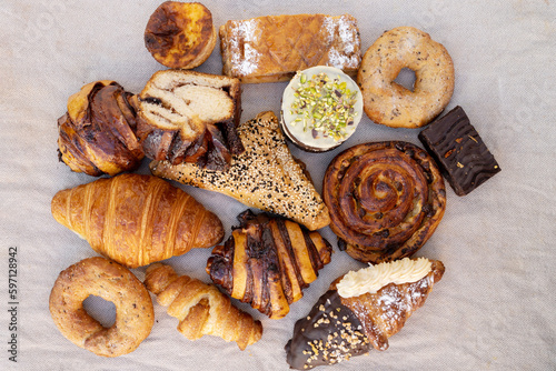 sweet pastry assortment top view.french pastries.Many mixed breads.Delicious looking french croisant, top view