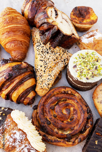 sweet pastry assortment top view.french pastries.Many mixed breads and rolls shot from above.