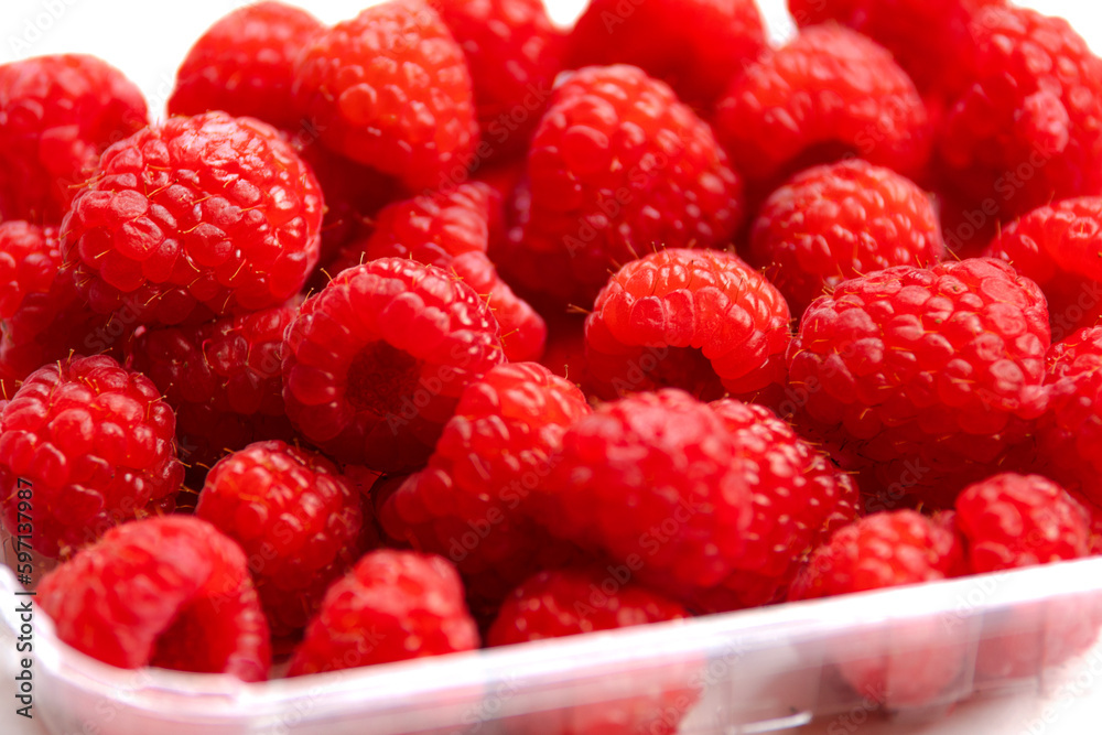 close up fresh raspberries on white background close up fresh raspberries on white background