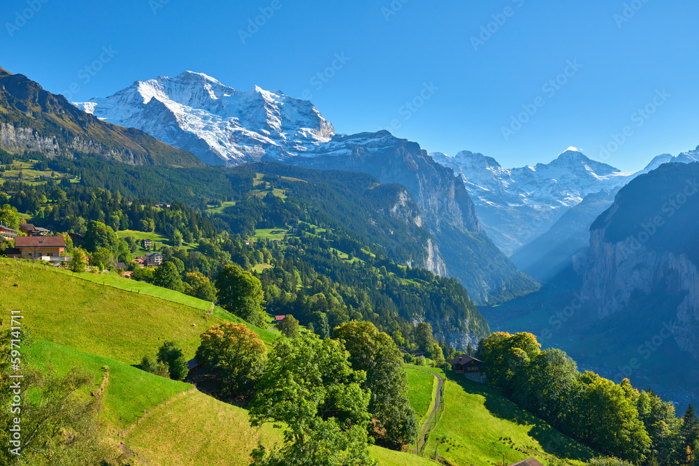 Mountain view of the high peaks near Wengen village in Switzerland. Mountain view of the high peaks near Wengen village in Switzerland.