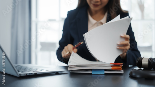 Portrait of female asian lawyer manager in formal suit working with signed insurance contract law, legal, legislation, online consulting real estate clients close deal in realtor office.