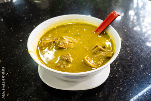 Sup kambing, or mutton soup is popular delicacy at mamak shop in Malaysia