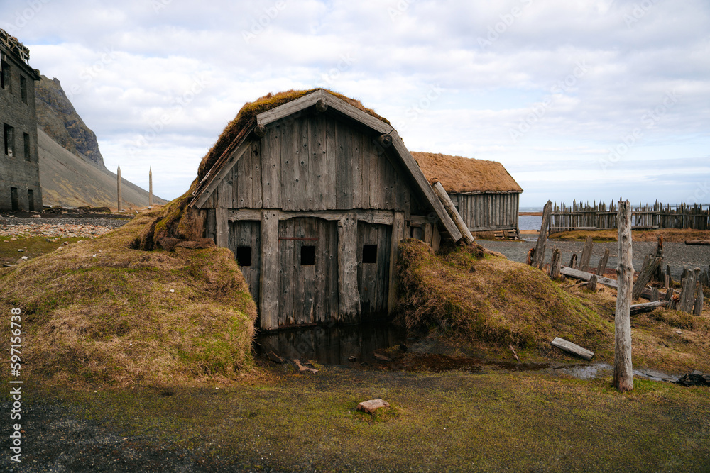 Abandoned viking village in Stokksnes, Iceland. The replica of the Viking houses and boats on the shore gives us a glimpse of how the Vikings used to live in the past. Abandoned viking village in Stokksnes, Iceland. The replica of the Viking houses and boats on the shore gives us a glimpse of how the Vikings used to live in the past.