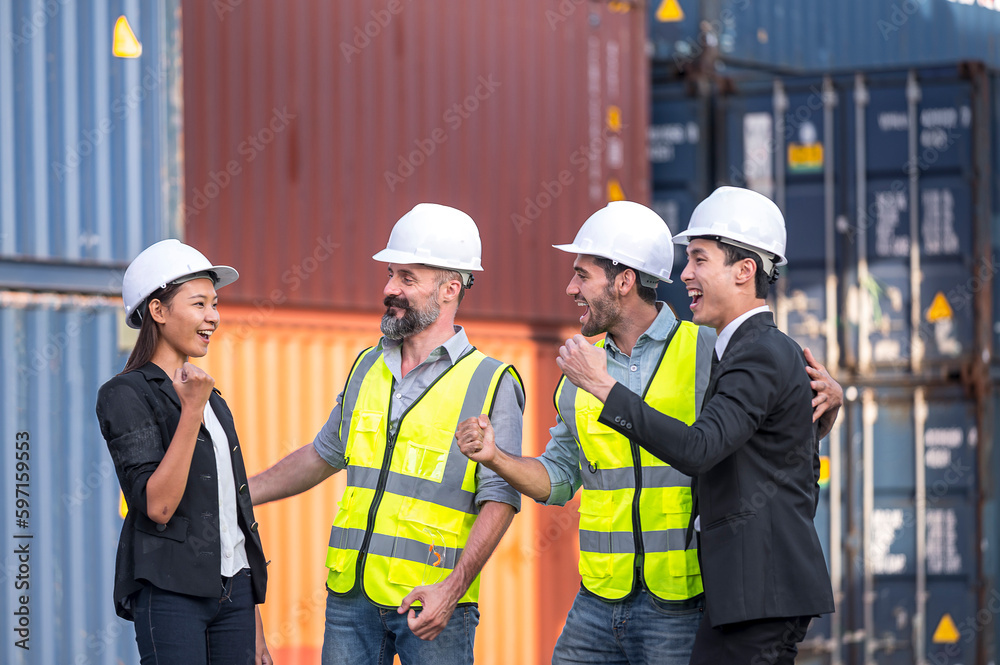 group of businessman, Logistics engineer and inspector and businessman cheer up and happy to about success business deal and project in shipping containerin commercial transport port group of businessman, Logistics engineer and inspector and businessman cheer up and happy to about success business deal and project in shipping containerin commercial transport port