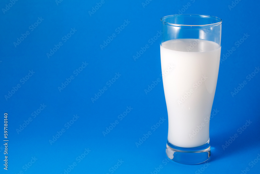 Photo of milk in a large glass. Photo of milk in a large glass.