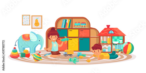 Kids in playing room with toys, boy and girl