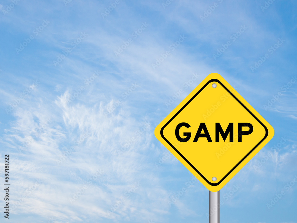 Fototapeta premium Yellow transportation sign with word GAMP (Abbreviation of Good Automated Manufacturing Practice) on blue color sky background