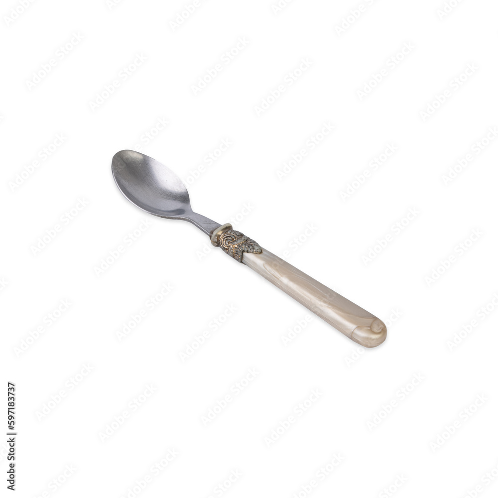 Old decorated metal spoon isolated over white background Old decorated metal spoon isolated over white background