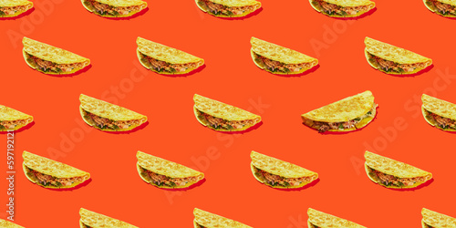 Pattern of corn tortilla tacos stuffed with vegetables and meat on a red background. Traditional Tex-Mex dish