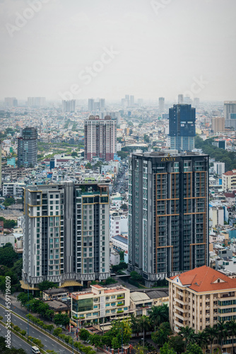 Ho Chi Minh city  Vietnam Apr 2023 Aerial view of Ho Chi Minh city skyline during midday look from a roof top of Gold view Apartment 