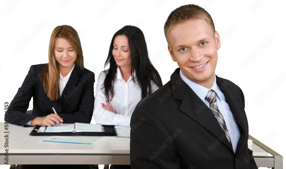Happy Businessman with Colleagues in the Background - Isolated Happy Businessman with Colleagues in the Background - Isolated