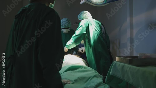 medical team revive a patient in cardiac arrest using a pacemaker