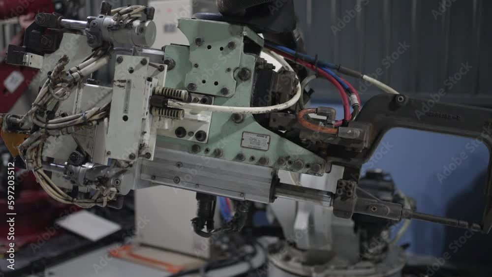 Engineer work at robotic arm factory. Engineer work at robotic arm factory.