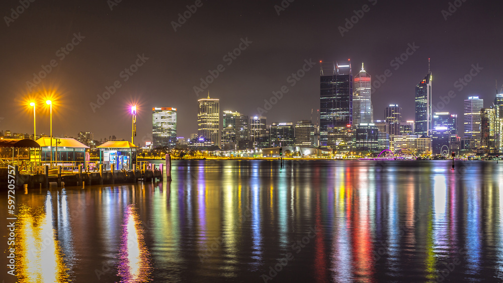Long exposure Perth City scape nighttime from the harbour view, night light panorama photography in low light.