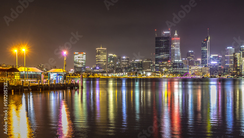 Long exposure Perth City scape nighttime from the harbour view, night light panorama photography in low light.