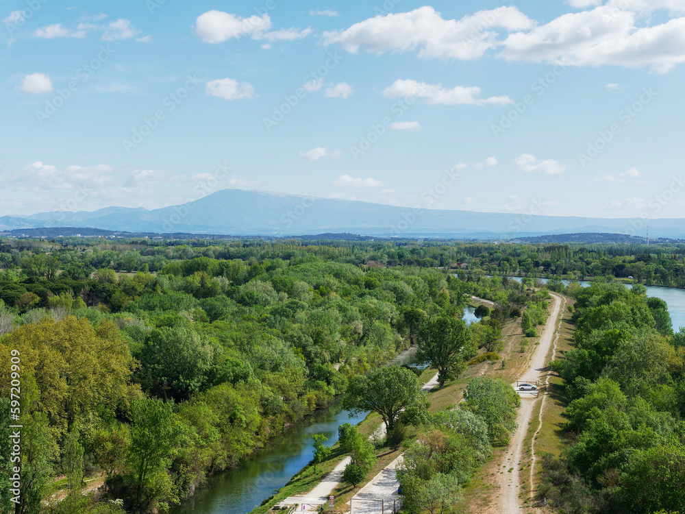 Counter-canal of Villeneuve-lès-Avignon running parallel to Rhone river, from top of Philippe-le-Bel Tower, with Mont Ventoux in the background