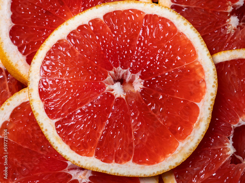 Grapefruit slices. Closeup fruit background photo