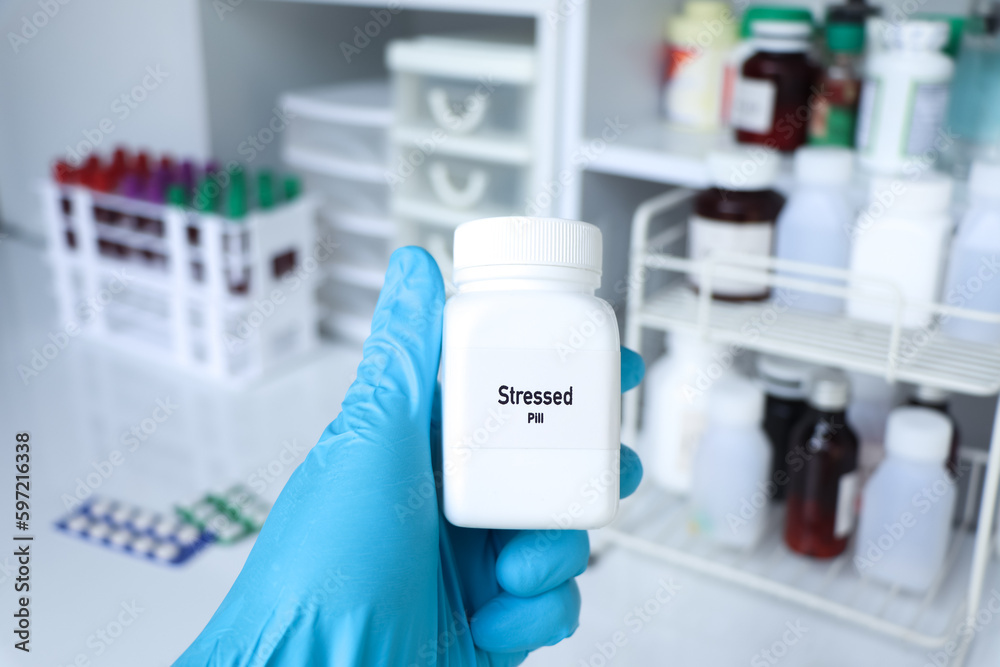 Stressed pill in white bottle, pill stock