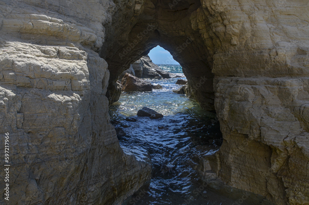 natural arch in Guvercinlik Koyu (Kleopatra Beach) near Ovacik (Cesme, Izmir province, Turkey) 