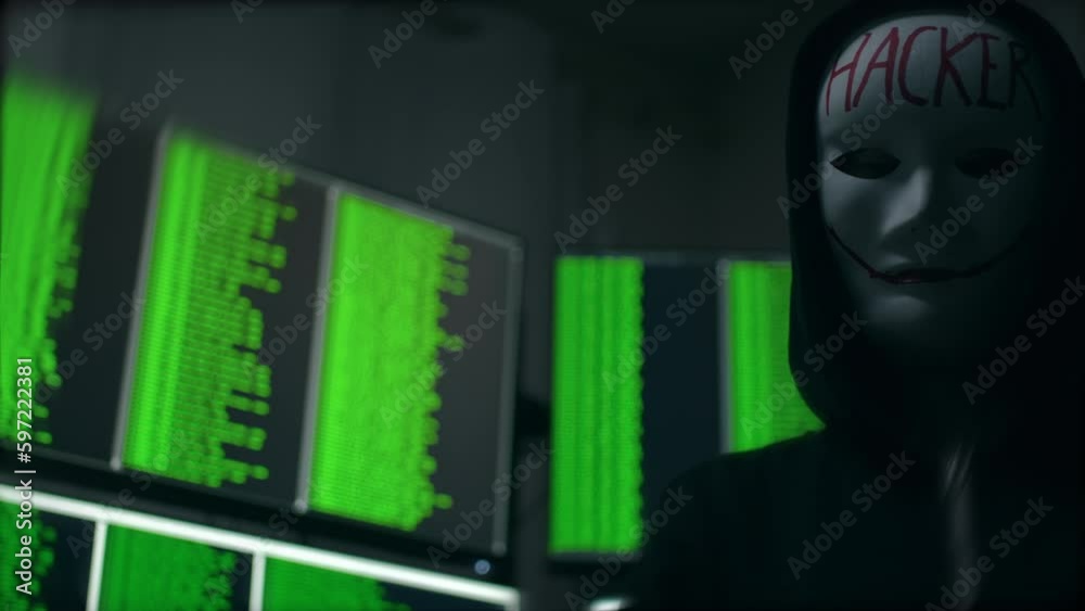 Cyber Hacker in A White Mask Disguise Hacking a Computer System With ...