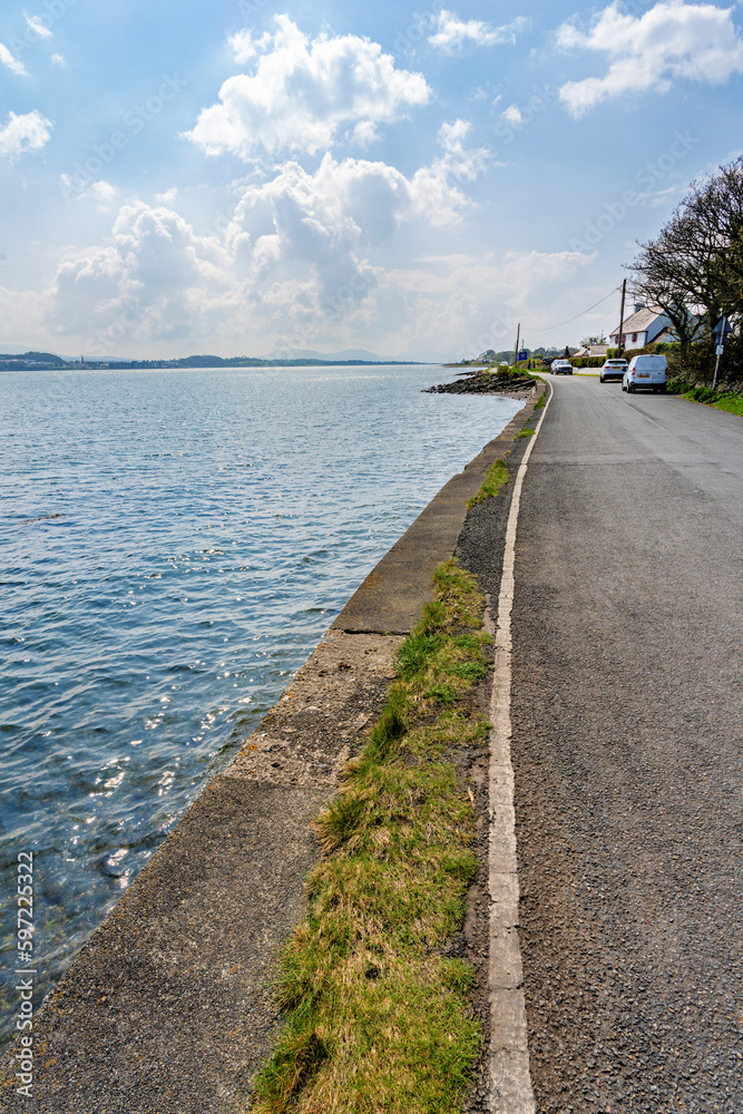 Tranquil coastal road along side the Menai Straits Anglesey