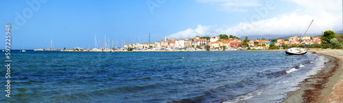 Fototapeta Naklejka Na Ścianę i Meble -  Panoramic view of the page and the marina of the famous seaside resort of Saint Florent, capital of the Nebbio region in Corsica, nicknamed the Island of Beauty