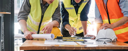 Engineer Teamwork Meeting, Drawing working on blueprint meeting for project working with partner on model building and engineering tools in working site, Construction and structure concept..