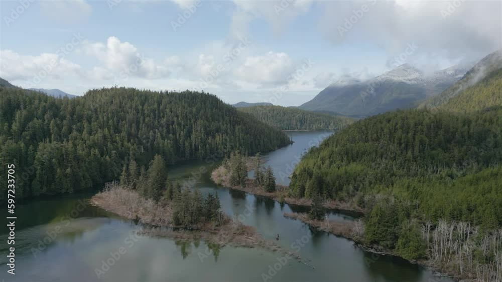 Aerial View of Canadian Mountain Landscape and Lake. Taken in Vancouver Island, British Columbia, Canada. Nature Background. Cinematic Aerial View of Canadian Mountain Landscape and Lake. Taken in Vancouver Island, British Columbia, Canada. Nature Background. Cinematic