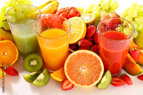 assorted of fruit juice into glasses