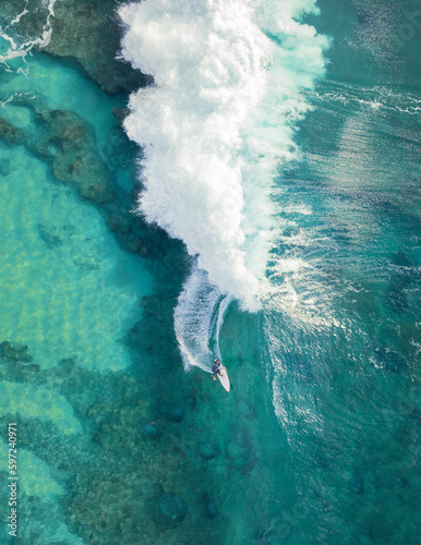 Photography Surfer on the wave in Hawaii aerial