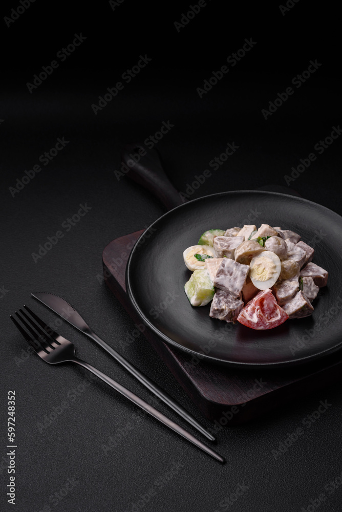 Delicious salad with boiled beef tongue, quail eggs, tomatoes and cucumber Delicious salad with boiled beef tongue, quail eggs, tomatoes and cucumber