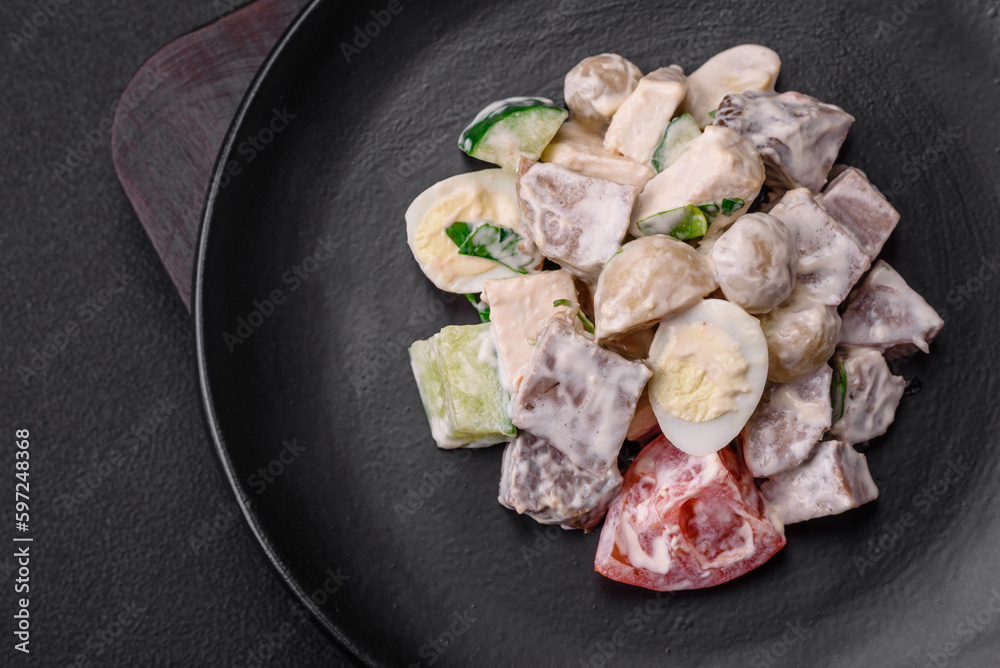 Delicious salad with boiled beef tongue, quail eggs, tomatoes and cucumber Delicious salad with boiled beef tongue, quail eggs, tomatoes and cucumber
