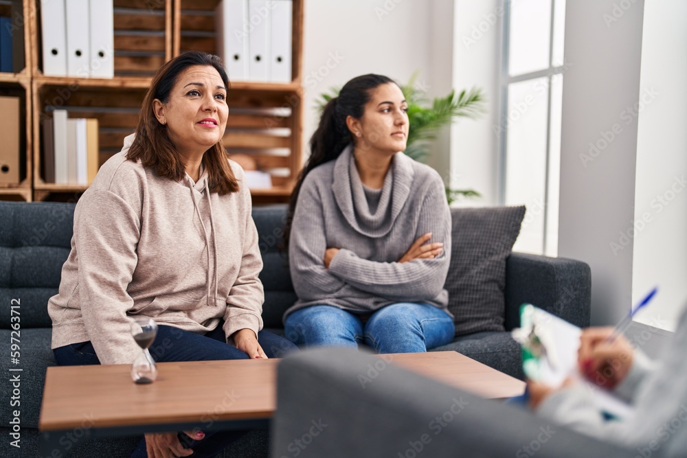 Three woman mother and daughter having psychology therapy at psychology center Three woman mother and daughter having psychology therapy at psychology center
