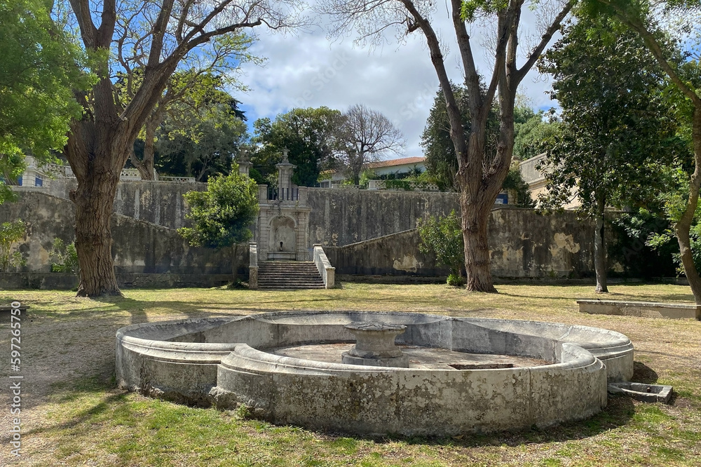 Historical pond fountain in Lisbon garden