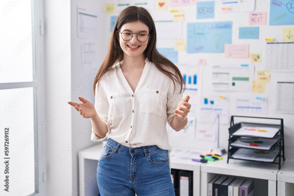 Young caucasian woman business worker smiling confident speaking at office Young caucasian woman business worker smiling confident speaking at office