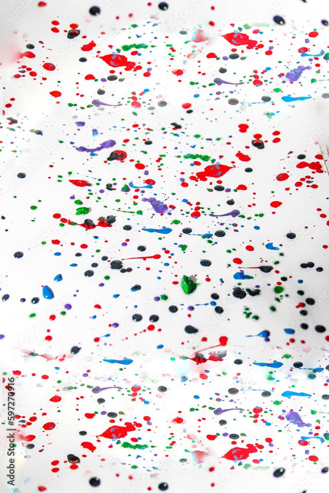 Multicolored splashes of gouache paint drops	
