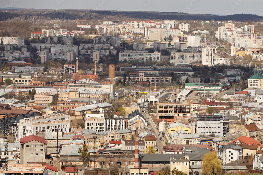 Panorama of the city of Lviv in Western Ukraine from a bird's eye view. Modern architecture of a medieval city. North-western districts of the millionth city. Residential buildings, businesses