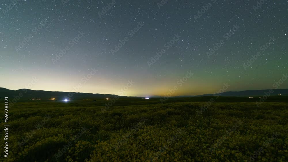 Time lapse tracking of Milky Way galaxy over wildflower superbloom at Carrizo Plain in Southern California, USA Time lapse tracking of Milky Way galaxy over wildflower superbloom at Carrizo Plain in Southern California, USA